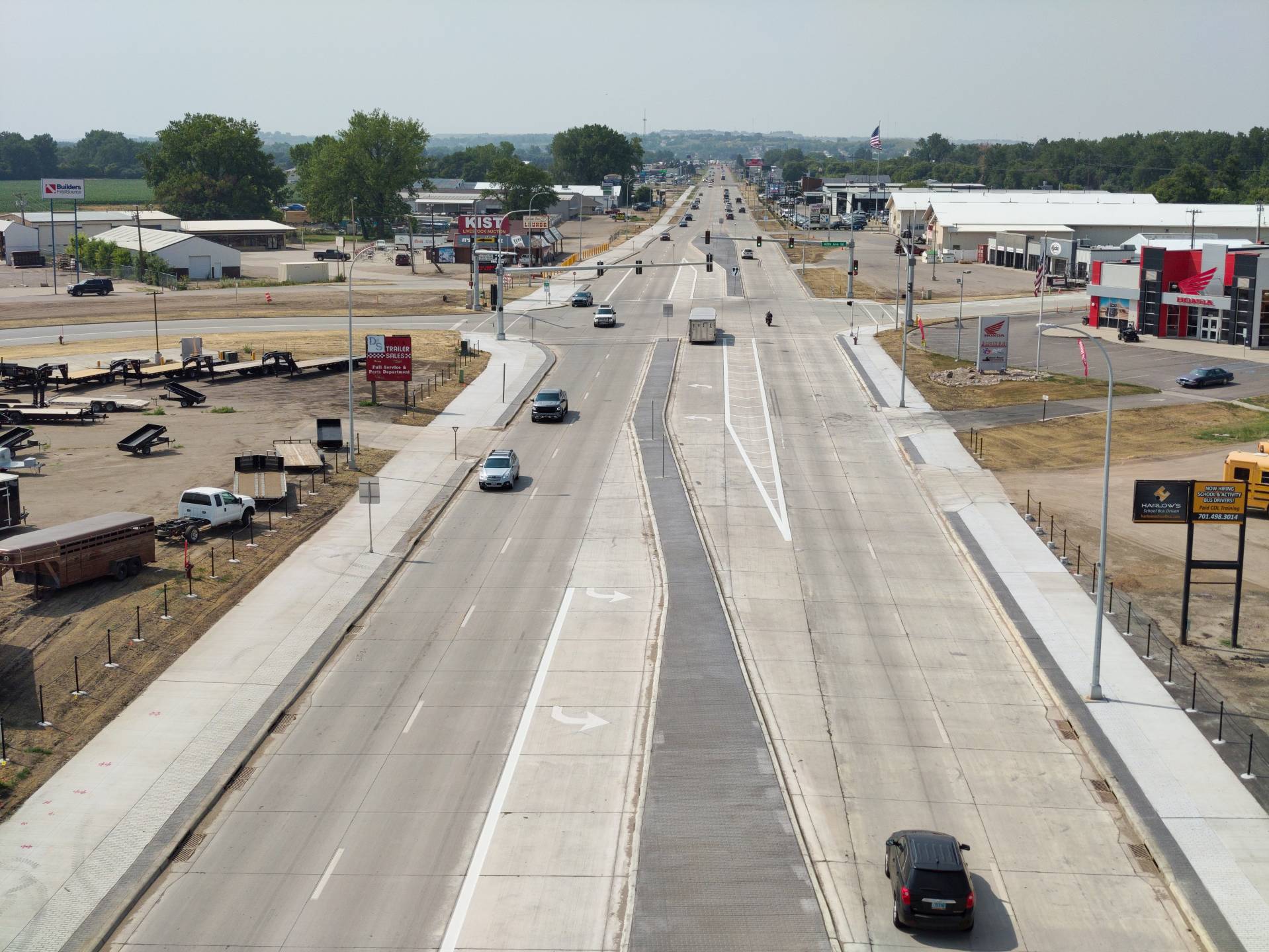 Aerial view of the completed Memorial Highway East reconstruction project, showing the finished roadway, lanes, and surrounding infrastructure, July 2026.