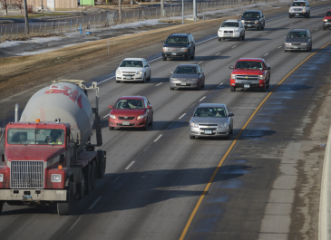 Cars and trucks driving on Interstate 94.