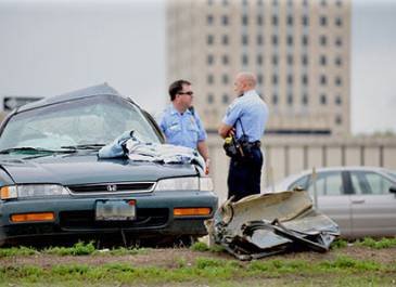 Police responding to a car accident.