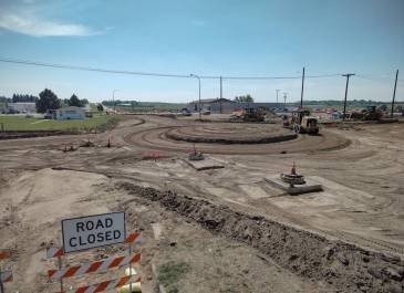 Aerial view of the ND Highway 22 and 8th Street roundabout construction in Dickinson, N.D., showing the work zone.