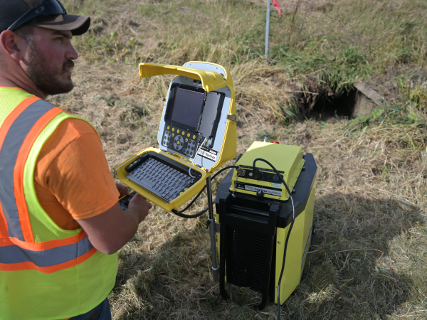 Pipe crawler tech checking out the structural integrity of a culvert.