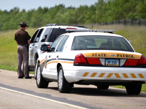 Highway Patrol pulling over vehicle on Interstate 94.