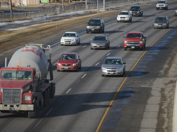 Cars and trucks driving on Interstate 94.