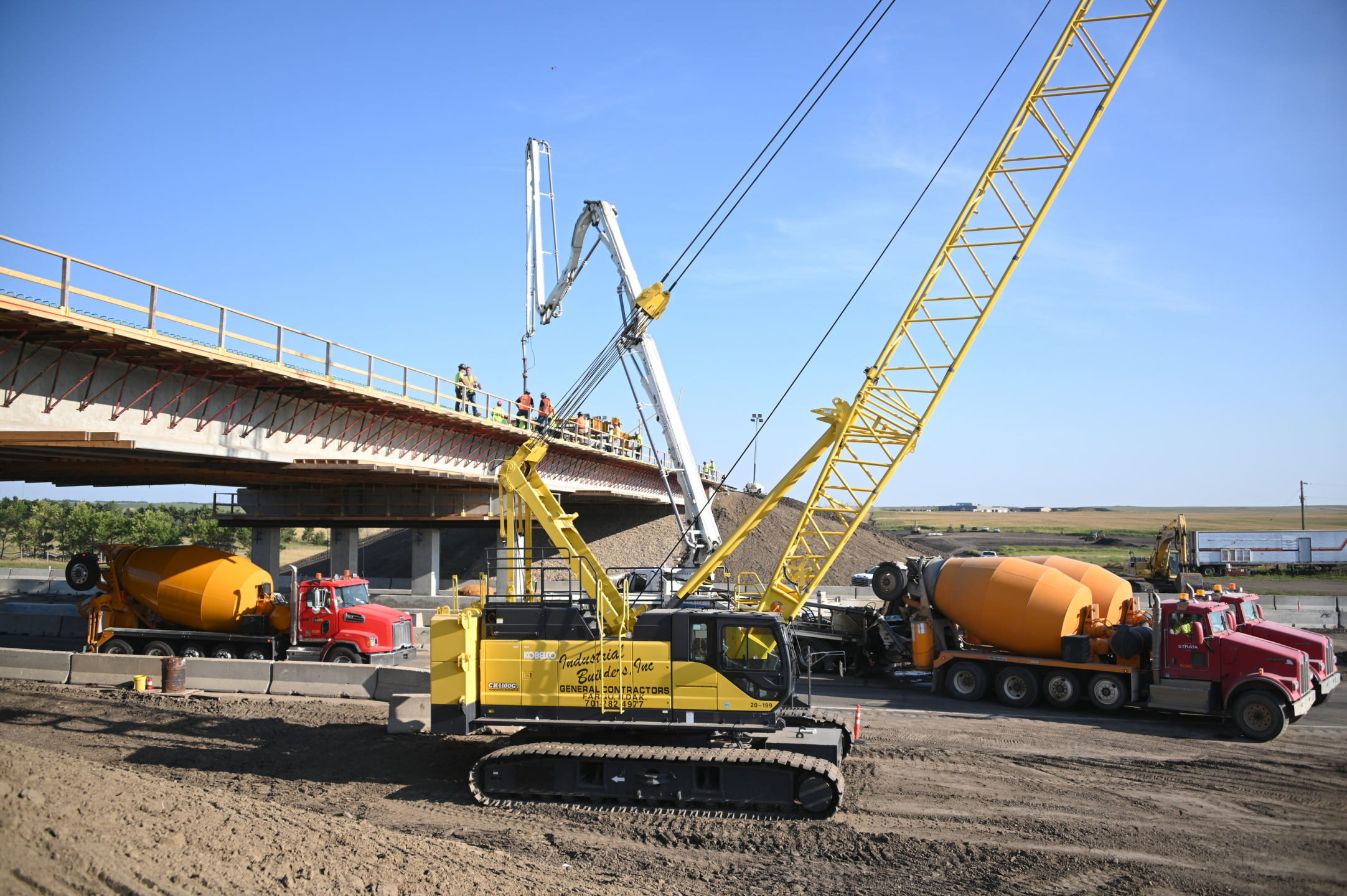 Crane and heavy equipment at a construction site