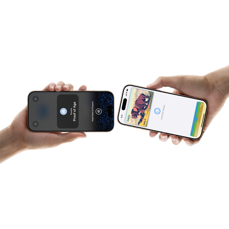 Two iPhones being held closely together to exchange ID information.