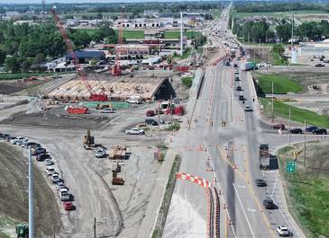 June '25 New bridge construction, temporary pedestrian walkway facing northwest