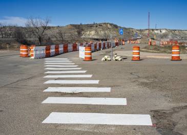 A new Shared Use Path (SUP) at Chimney Park Entrance is in progress. Curbs and gutters will also be installed on the west side of E. River Rd N