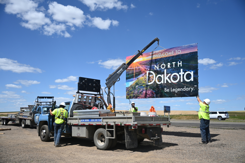 Installation of "Welcome to North Dakota" sign