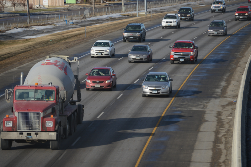 Cars and trucks driving on Interstate 94.
