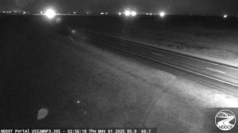 Traffic camera looking at North Dakota Hwy 52 about 3 miles from the Canadian North Portal border crossing. 